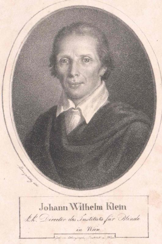 Schwarzes und weißes Porträt von Johann Wilhelm Klein, Direktor des Instituts für Blinde in Wien, der einen weißen Hemd und einen ernsten Gesichtsausdruck trägt, mit deutschem Text unten.