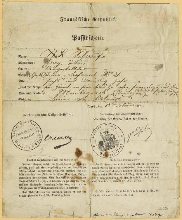 Gelbliches deutsches Regierungsdokument mit einem kreisförmigen schwarzen Randstempel und schwarzer Tinte.
