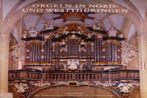 Ein Plakat mit einer detaillierten Abbildung eines Organs in Nord- und Westthüringen, einer Kirche in Deutschland, mit Texten, die Informationen über das Organ und seine Bedeutung liefern.