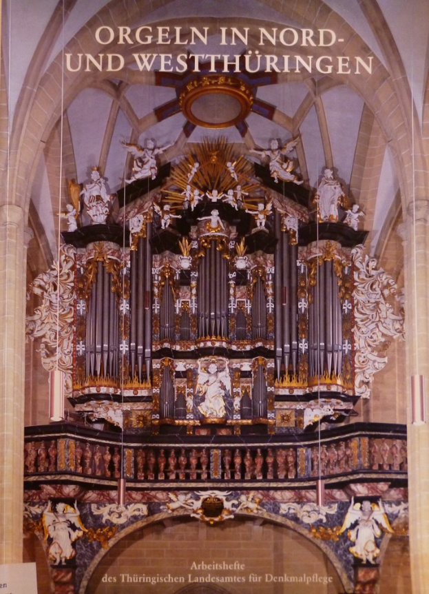 Ein Plakat mit einer detaillierten Abbildung eines Organs in Nord- und Westthüringen, einer Kirche in Deutschland, mit Texten, die Informationen über das Organ und seine Bedeutung liefern.