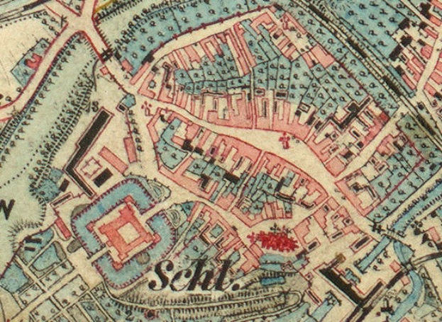 Ein detaillierter alter Stadtplan von Schleswig-Holstein, Deutschland, der Straßen, Gebäude und Sehenswürdigkeiten mit Textanmerkungen zeigt.