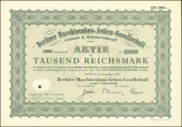 Ein altes deutsches Wertpapier mit schwarzem und grünem Rand, auf dem gedruckter Text zu sehen ist.