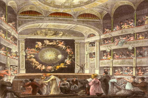 Ein Gemälde eines großen Auditoriums voller Menschen, einige stehen, einige sitzen auf dem Boden, mit Tierstatuen und detaillierten Deckenentwürfen, beschriftet mit 'The Theatre Royal, London, England'.