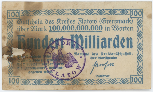 Alte deutsche Banknote mit dem Text "Grenzmark 100.000.000" und einem violetten Stempel auf einem weißen Hintergrund.