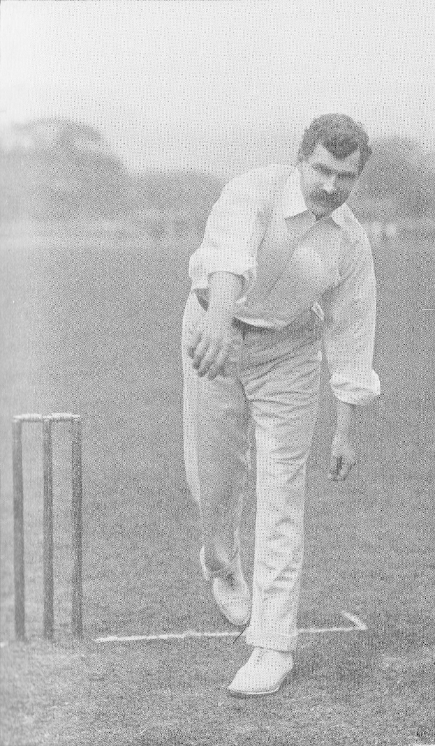 Ein Mann in einem weißen Cricket-Outfit spielt auf einem Feld mit Wickets, Bäumen und Himmel im Hintergrund; der Text "Cricket Player of the Year" erscheint unten.