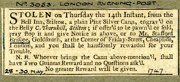 Eine schwarz-weiße Postkarte mit dem Bild eines Mannes und Text über einen gestohlenen Gegenstand.